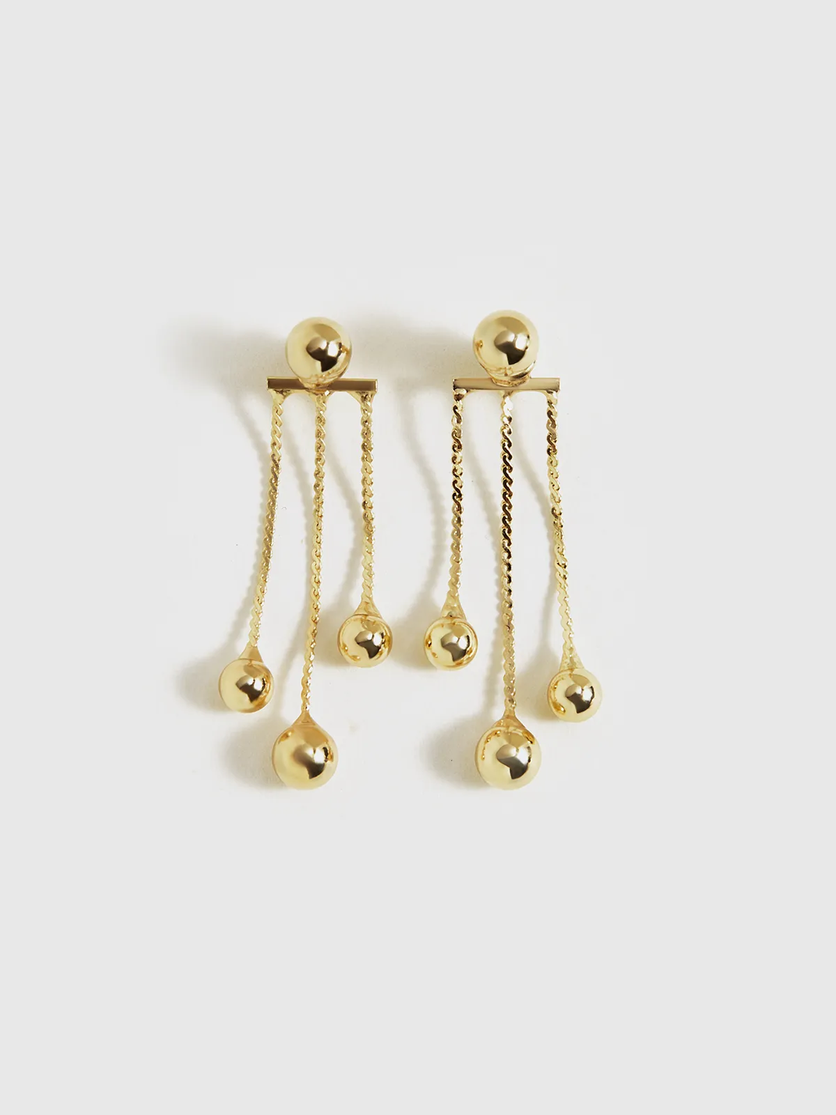 Golden Dangle Earrings sold by COMMENSE