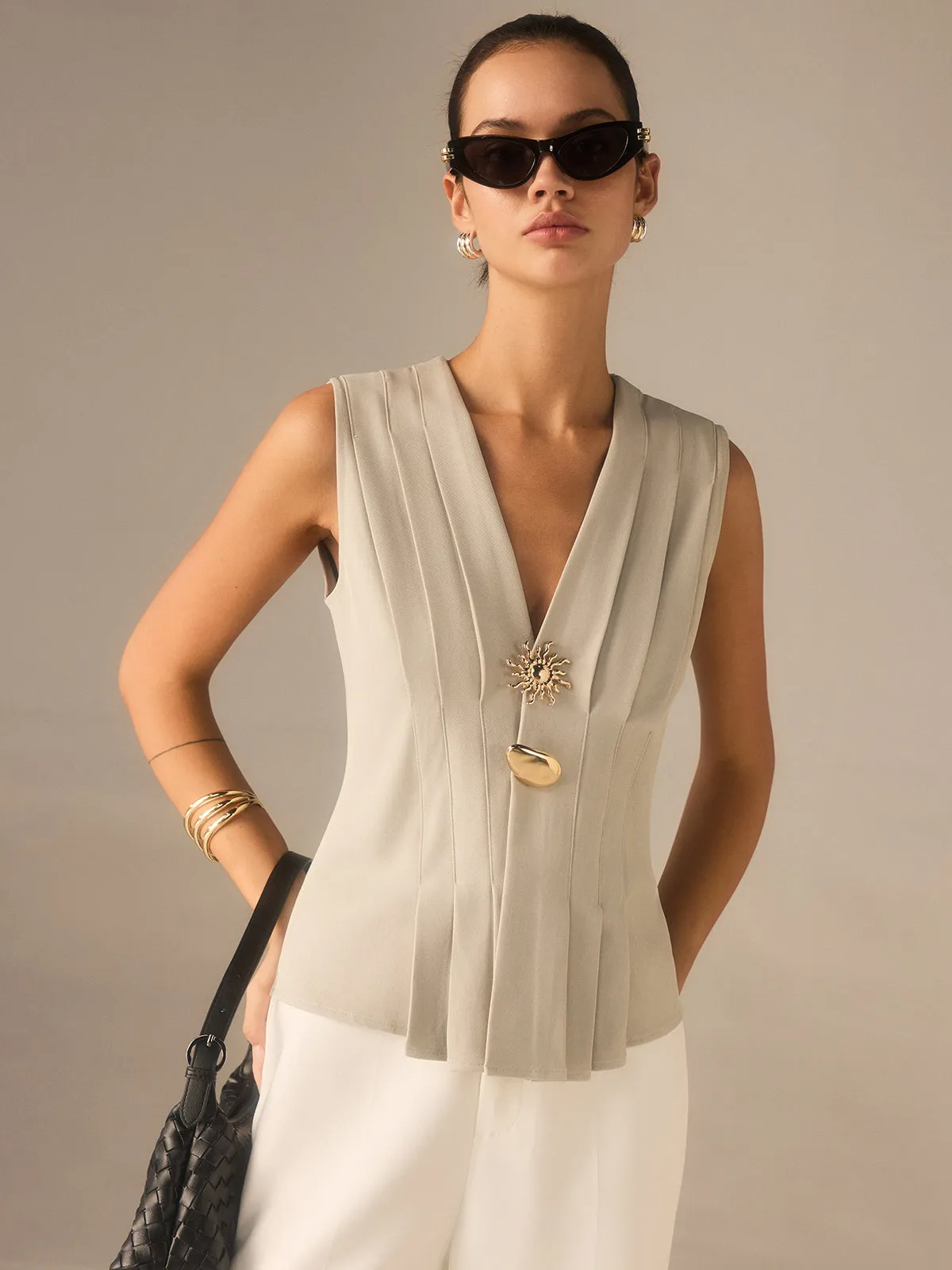 Pleated V-Neck Top with Metal Detail sold by COMMENSE