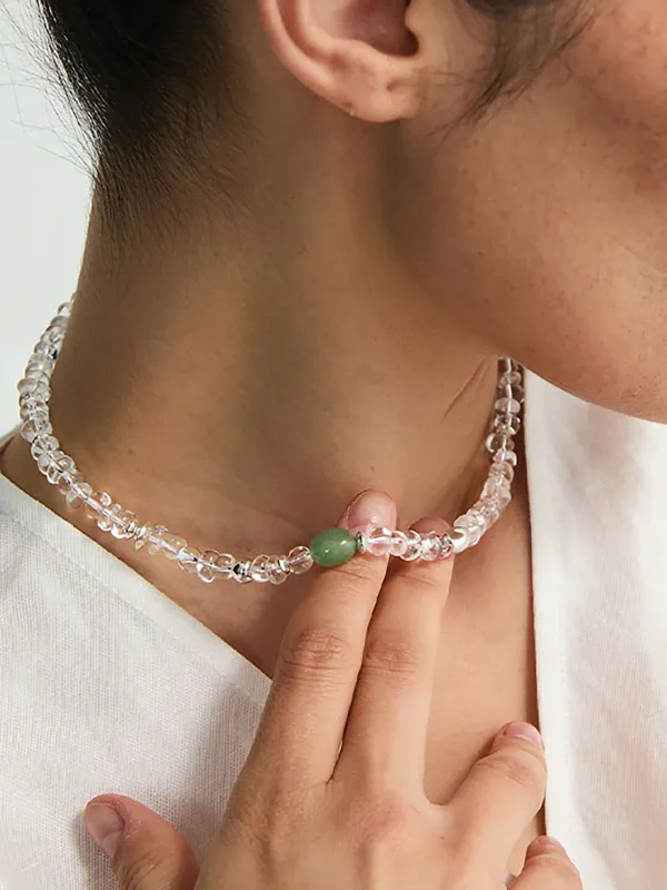 Clear Crystal Beaded Necklace with Green Gemstone Accent sold by COMMENSE