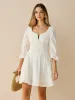 Cotton Scalloped Edge Eyelet Mini Dress sold by COMMENSE