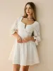 Cotton Scalloped Edge Eyelet Mini Dress sold by COMMENSE