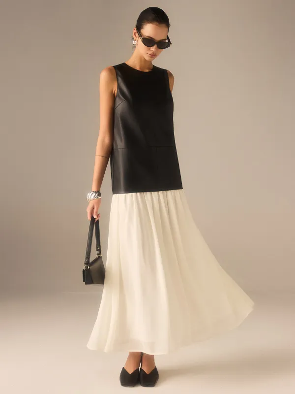 Two-Tone Faux Leather Chiffon Pleated Dress sold by COMMENSE