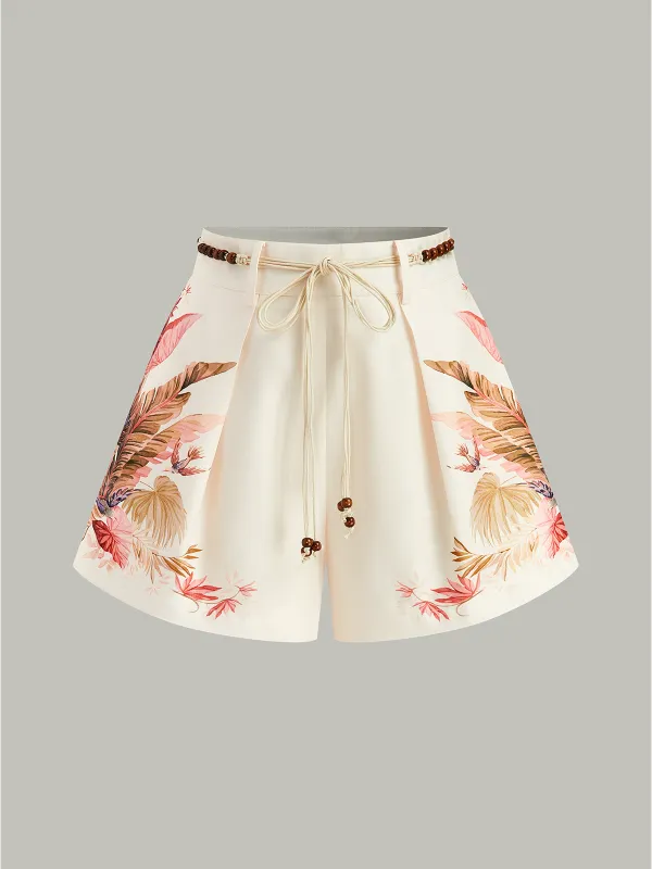 Belted Tropical Print Mid-Waist Shorts sold by COMMENSE
