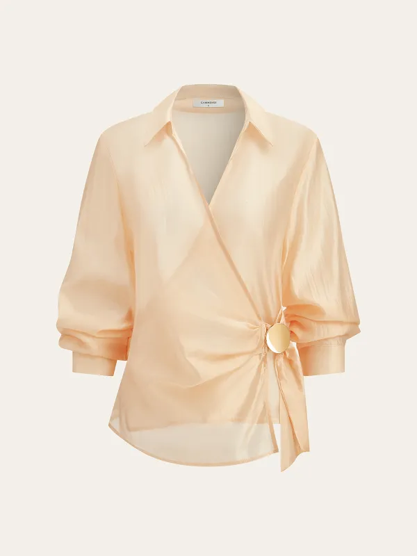 Semi-Sheer Metal Button Wrap Blouse sold by COMMENSE