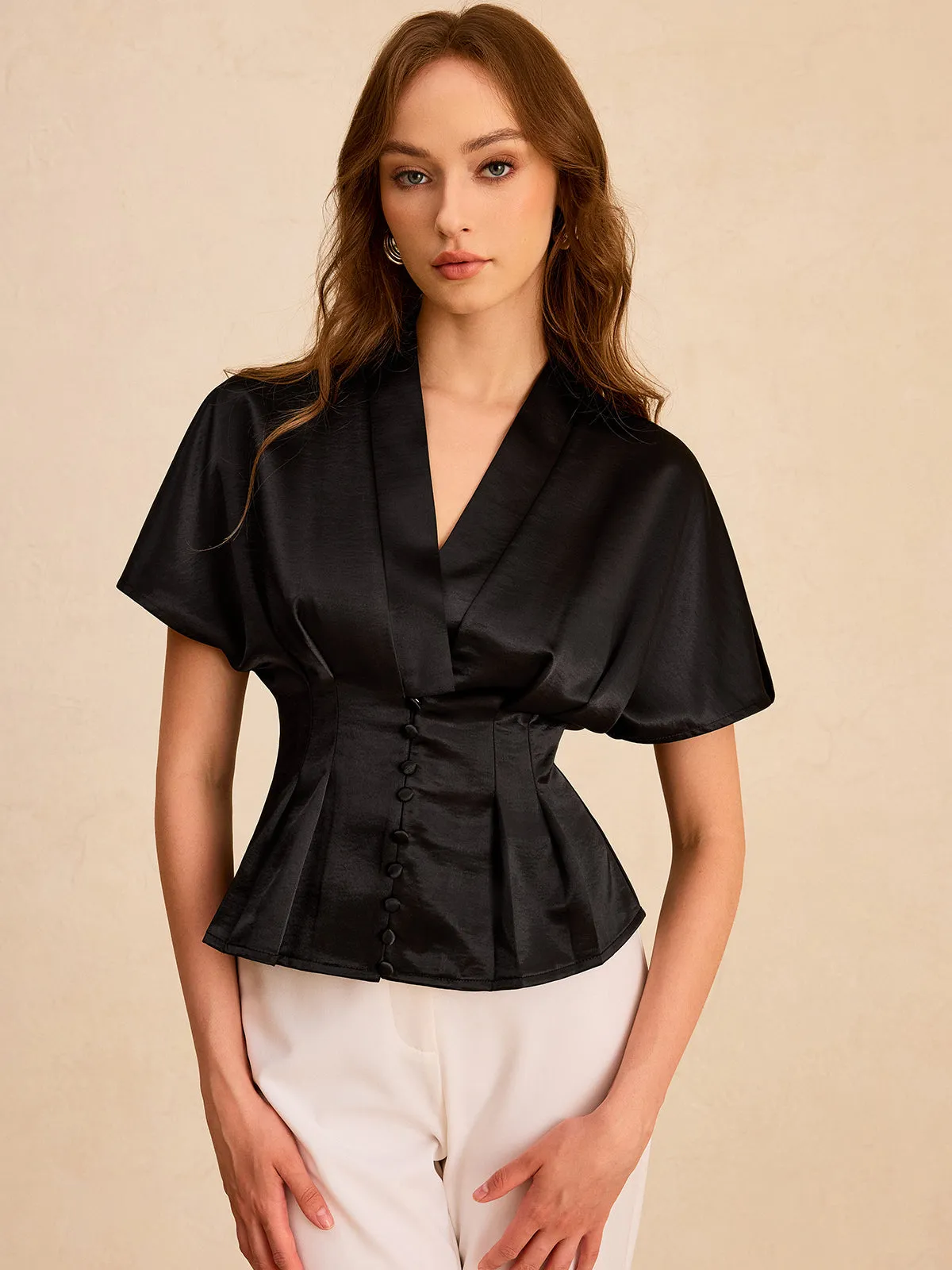 Satin Pleated Button Peplum Top sold by COMMENSE