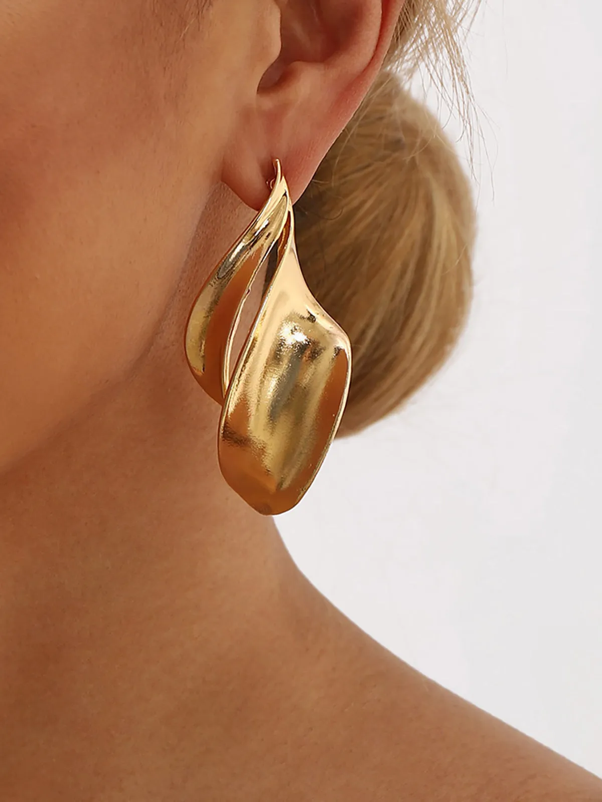 Twisted Leaf-Shaped Drop Earrings sold by COMMENSE
