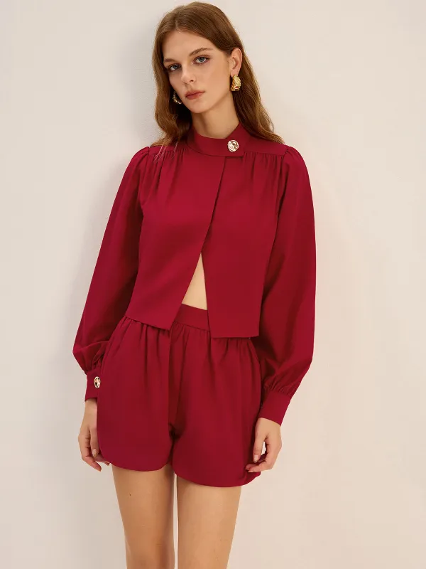 Metal Button Asymmetric Long-Sleeve Top sold by COMMENSE