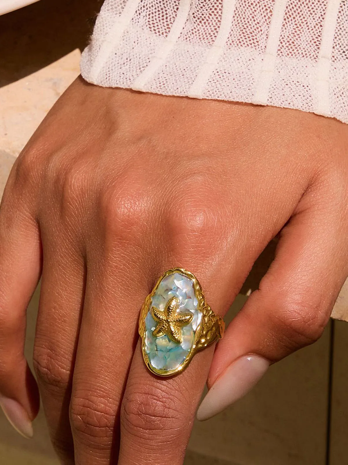 Golden Starfish Ring sold by COMMENSE