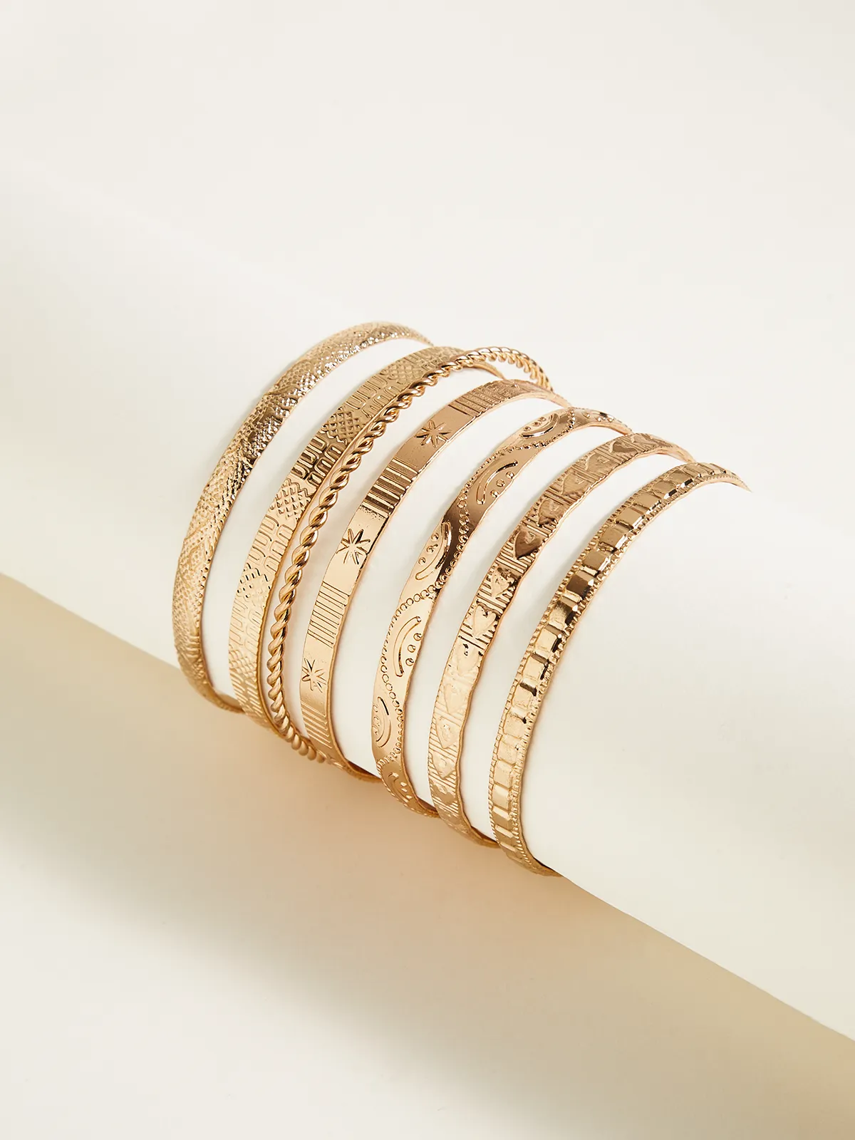 7pcs Golden Engraved Bracelet Set sold by COMMENSE