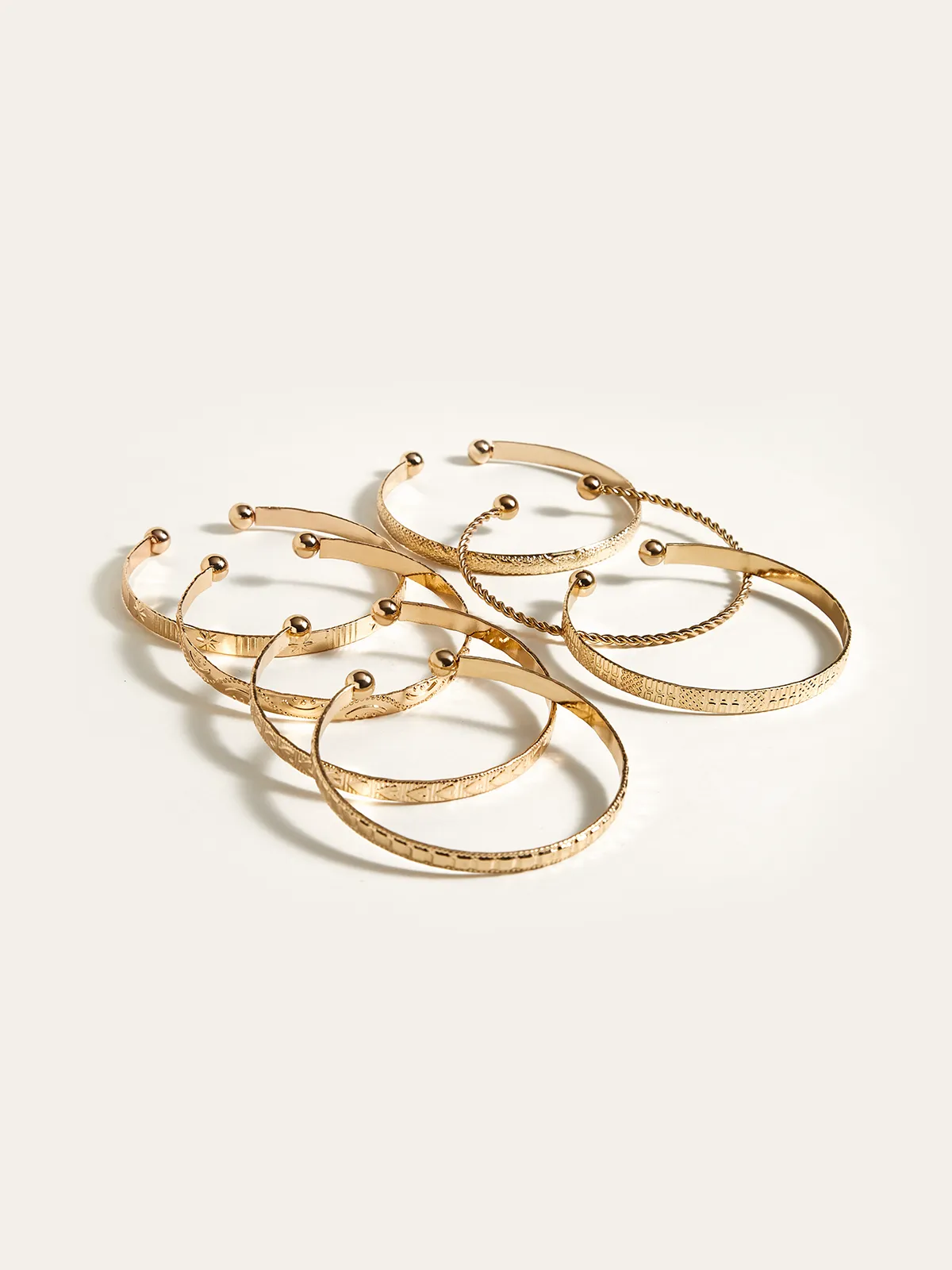 7pcs Golden Engraved Bracelet Set sold by COMMENSE product image thumbnail 2