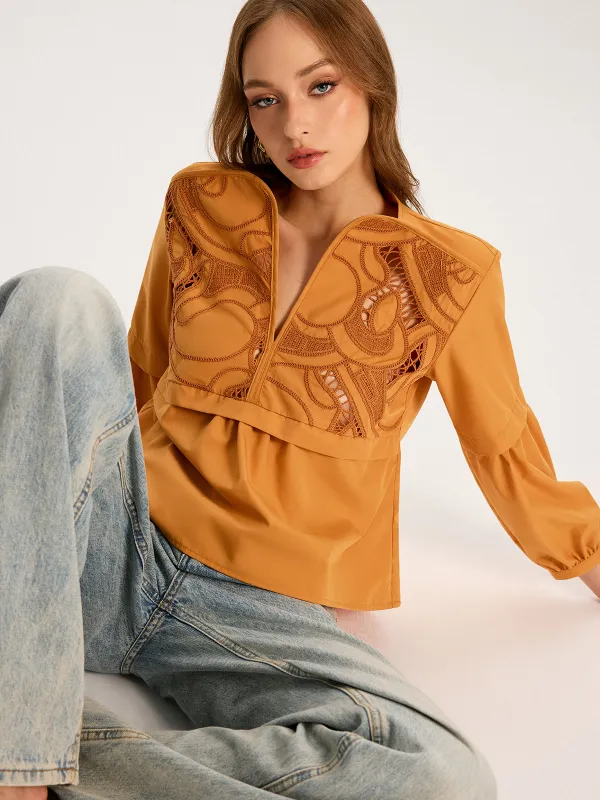 Cut-Out Embroidered Top sold by COMMENSE