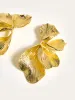 Golden Petal Earrings sold by COMMENSE