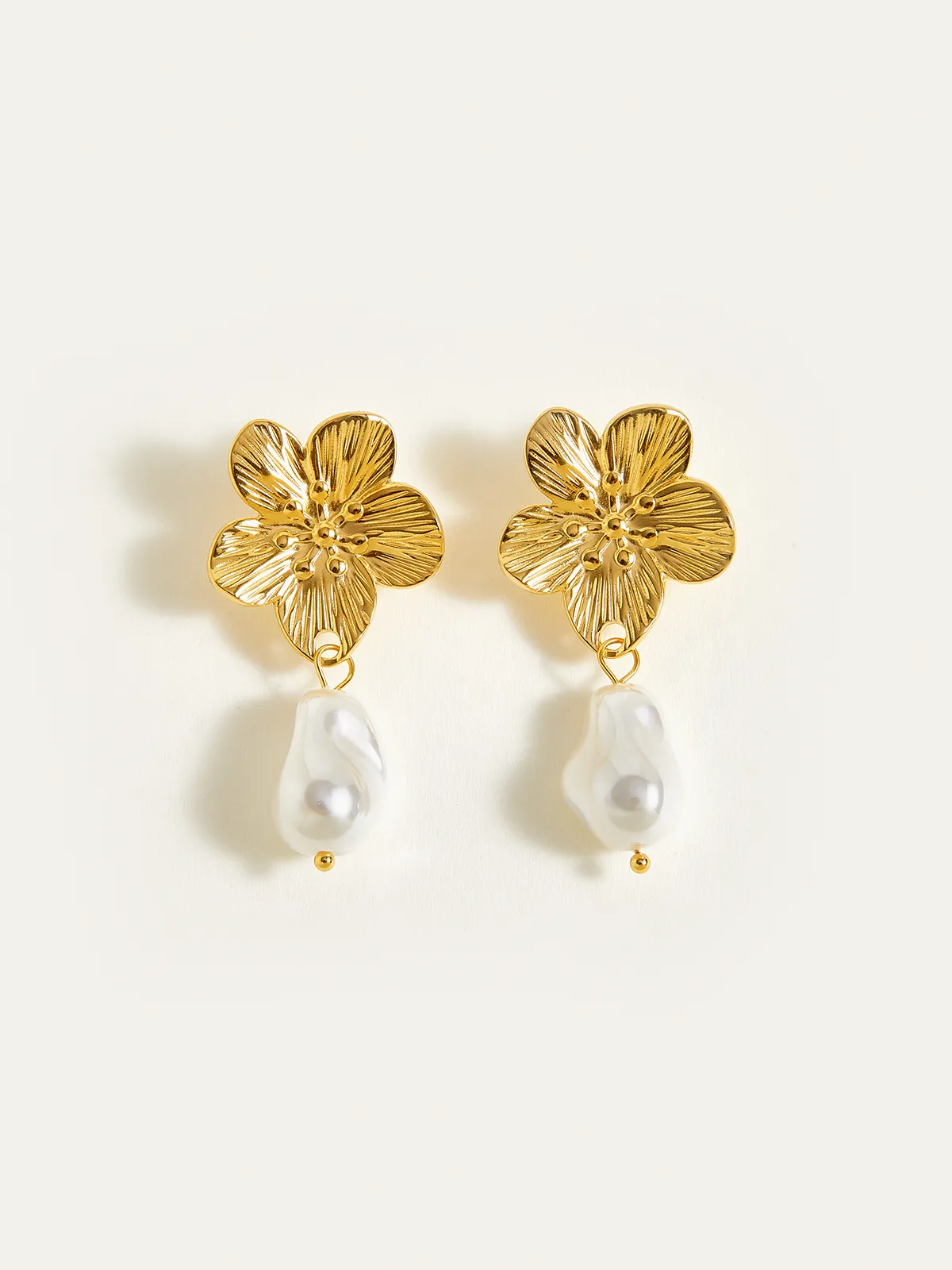 Golden Floral Pearl Drop Earrings sold by COMMENSE