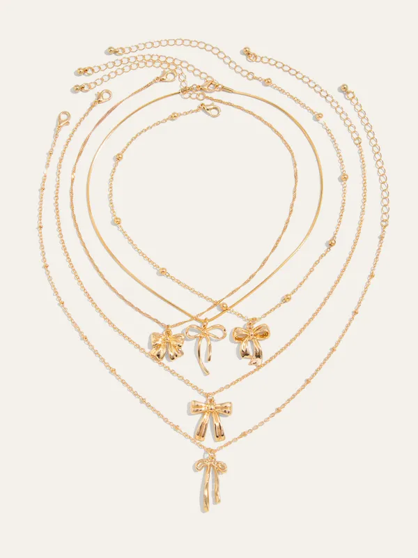 5pcs Bow Charm Necklace Set sold by COMMENSE