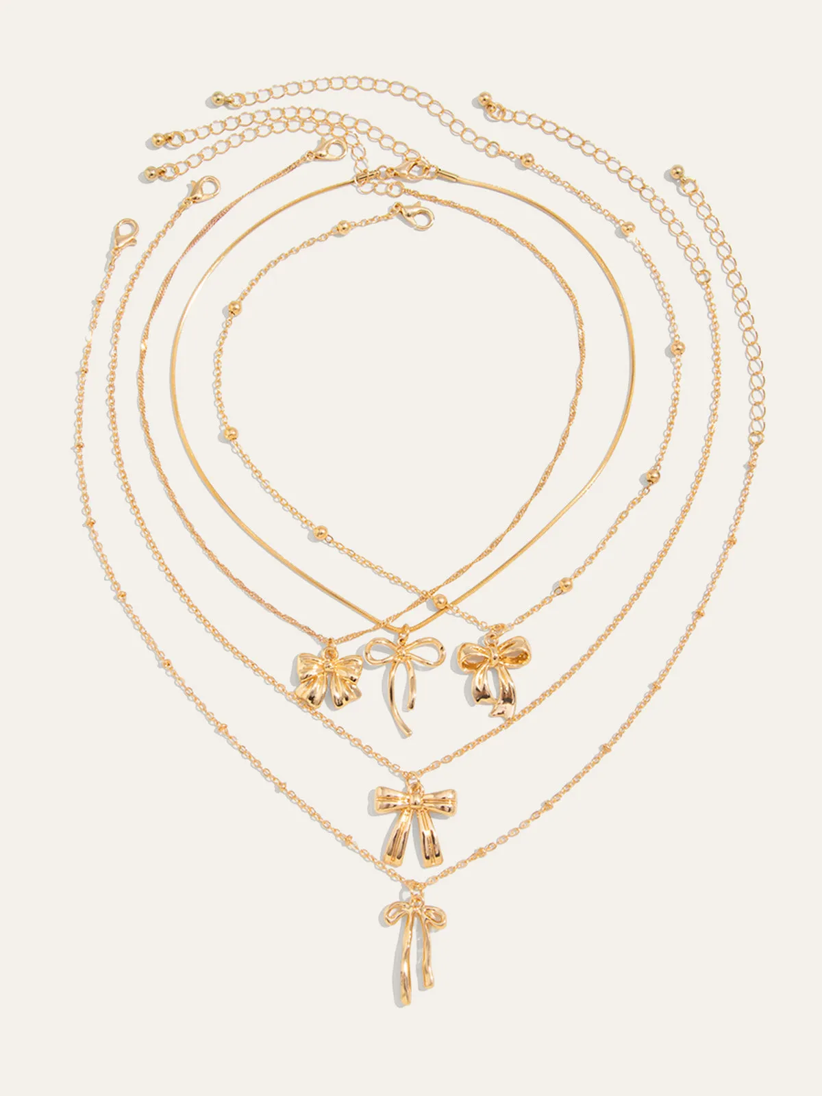 5pcs Bow Charm Necklace Set sold by COMMENSE
