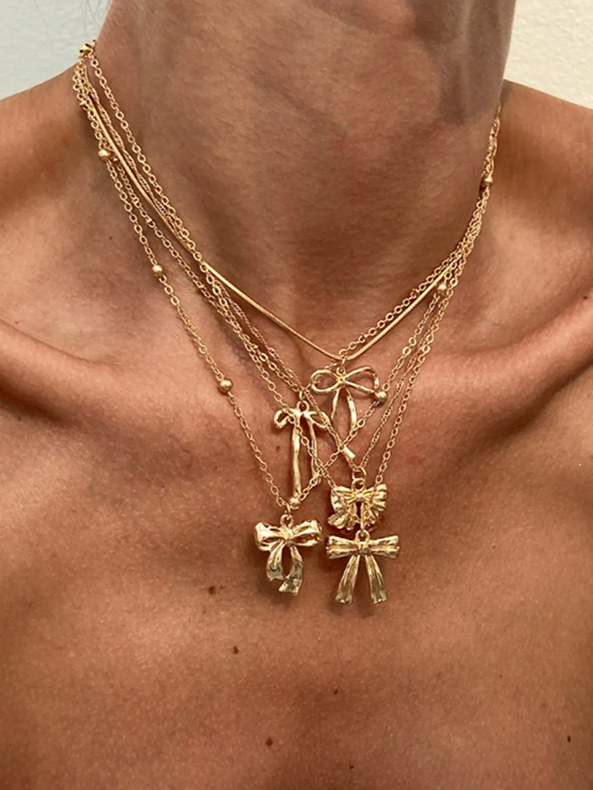 5pcs Bow Charm Necklace Set sold by COMMENSE product image thumbnail 2