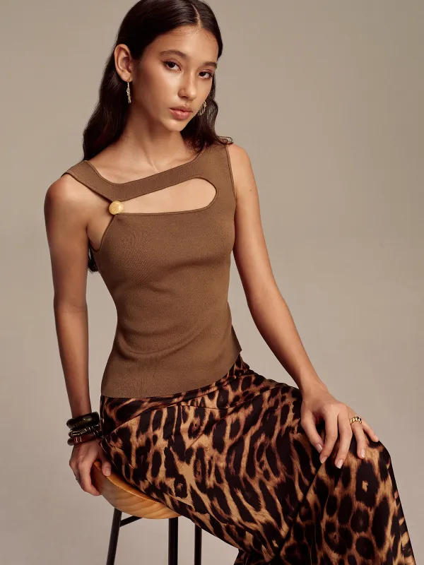Asymmetric Cut-Out Bead Sweater Vest sold by COMMENSE