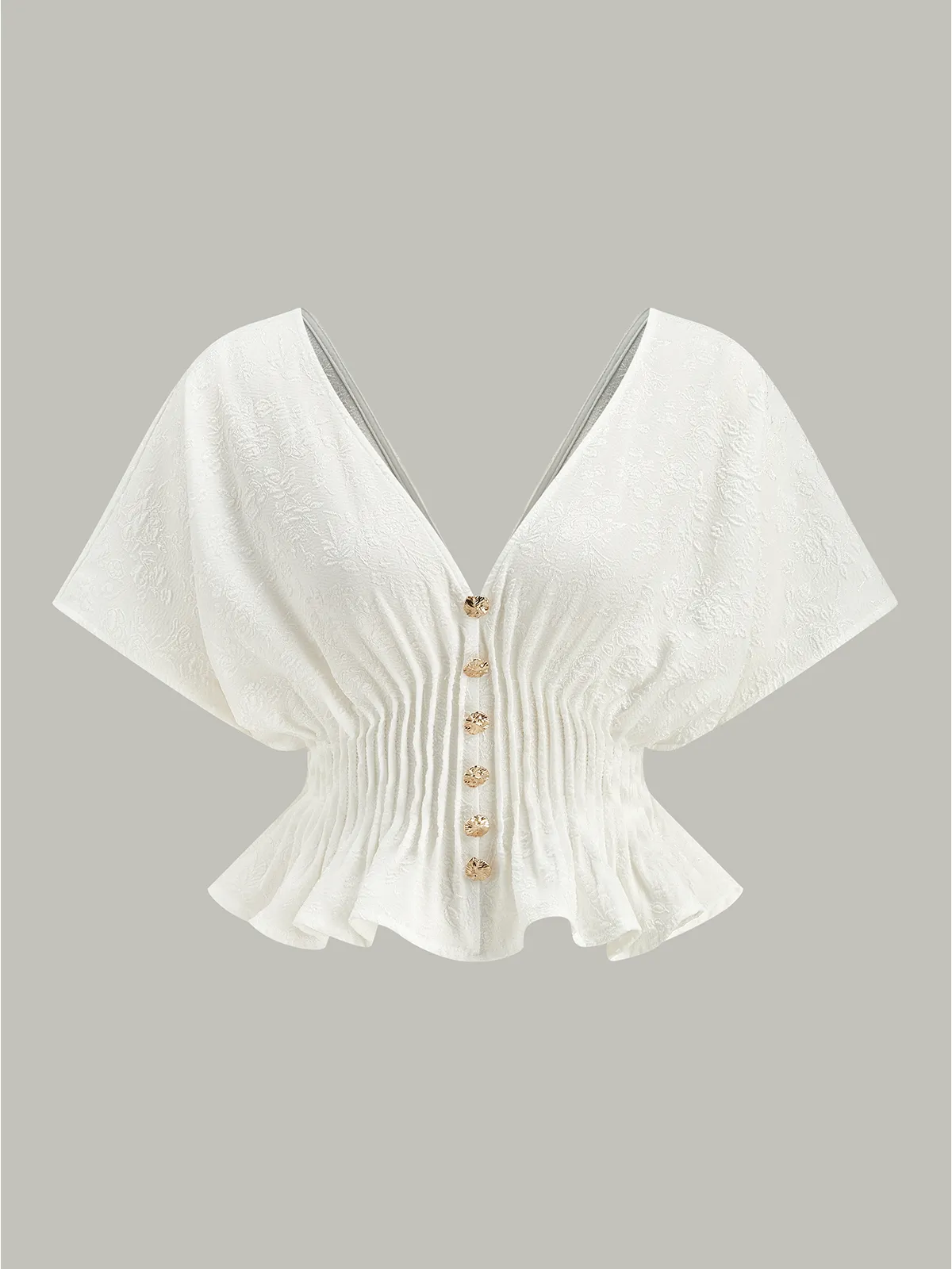 Textured Button Peplum Top sold by COMMENSE