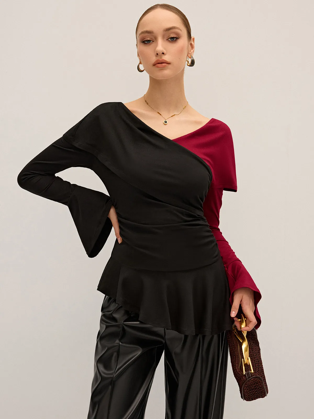Two-Tone Asymmetric Peplum T-Shirt sold by COMMENSE