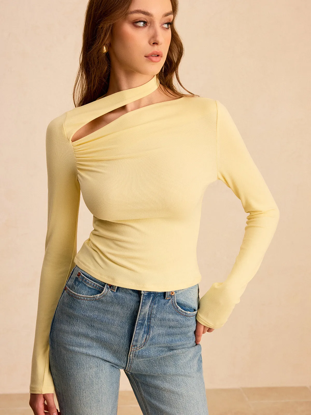 Asymmetric Cut-Out Ruched Long Sleeve Blouse sold by COMMENSE