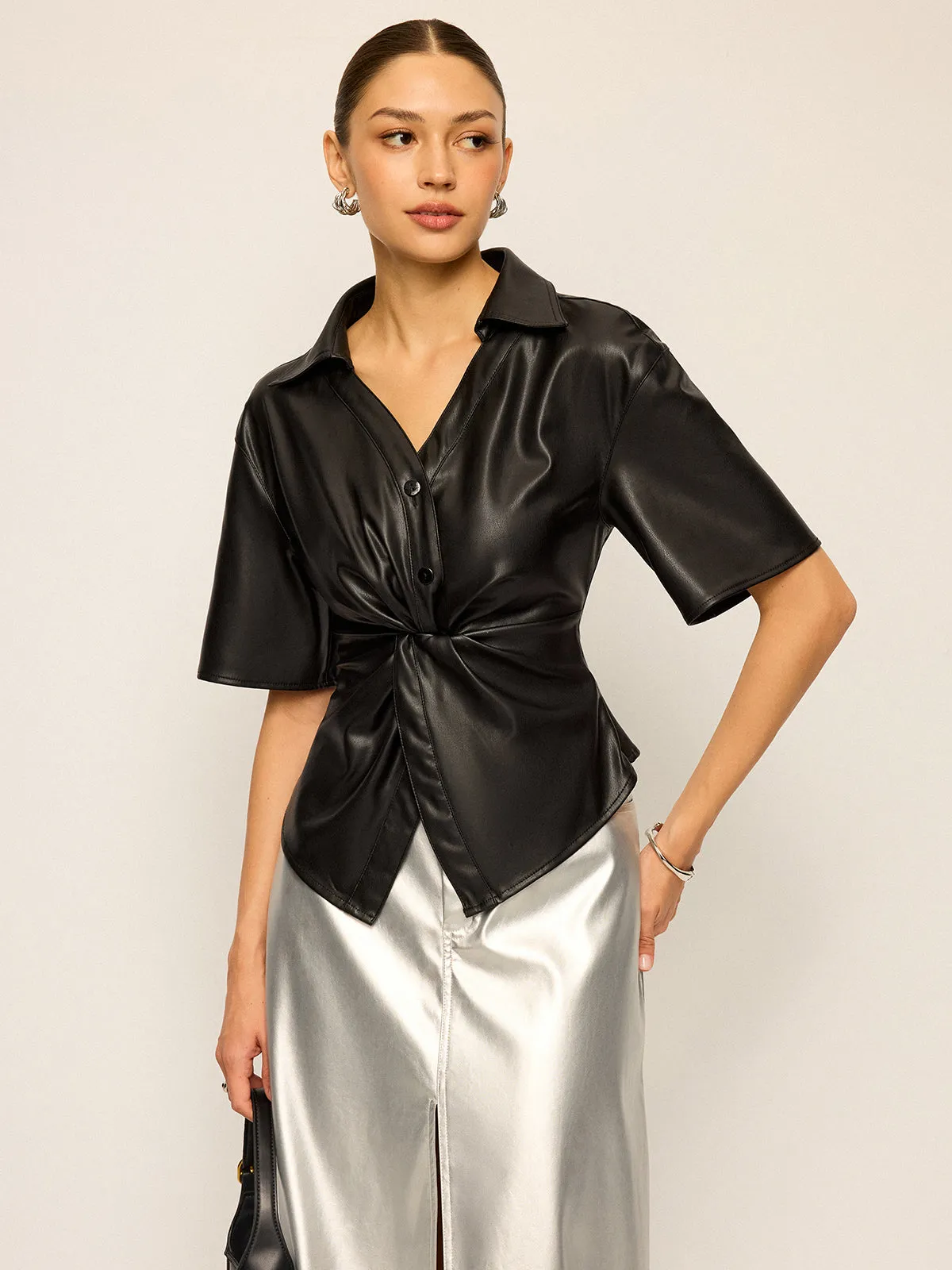 PU Leather Short Sleeve Twisted Blouse sold by COMMENSE