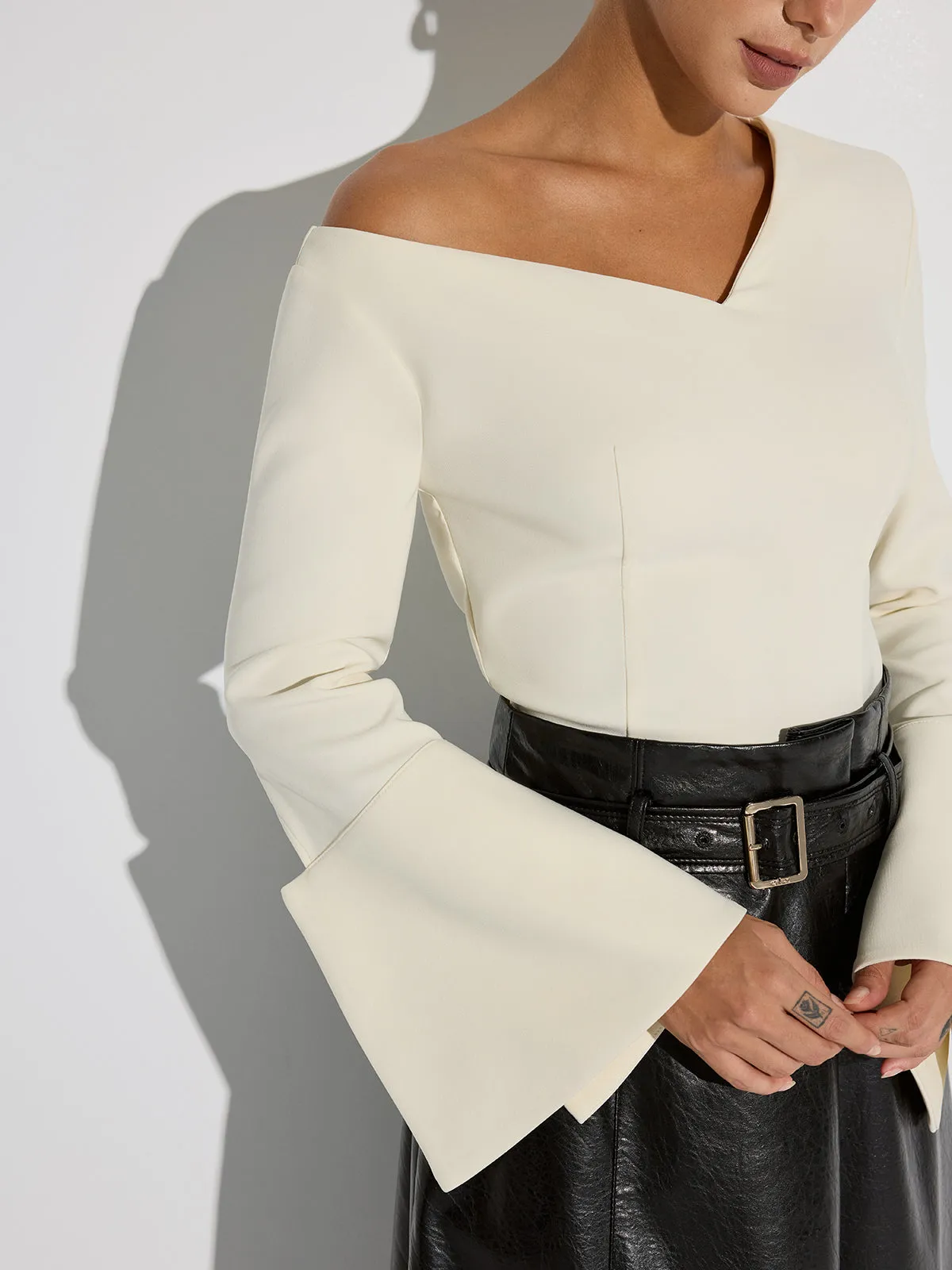 Asymmetric Off-Shoulder Bell-Sleeve Top sold by COMMENSE product image thumbnail 2