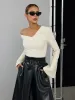 Asymmetric Off-Shoulder Bell-Sleeve Top sold by COMMENSE