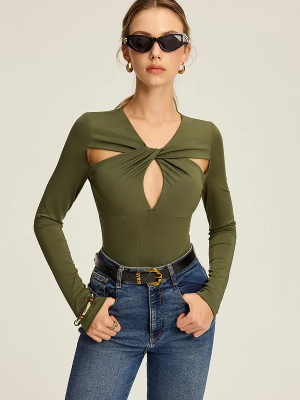 Cut-Out Twist Long Sleeve Blouse sold by COMMENSE