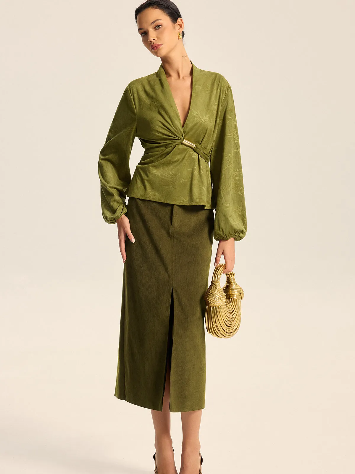 Textured Embossed Belted Wrap Top sold by COMMENSE