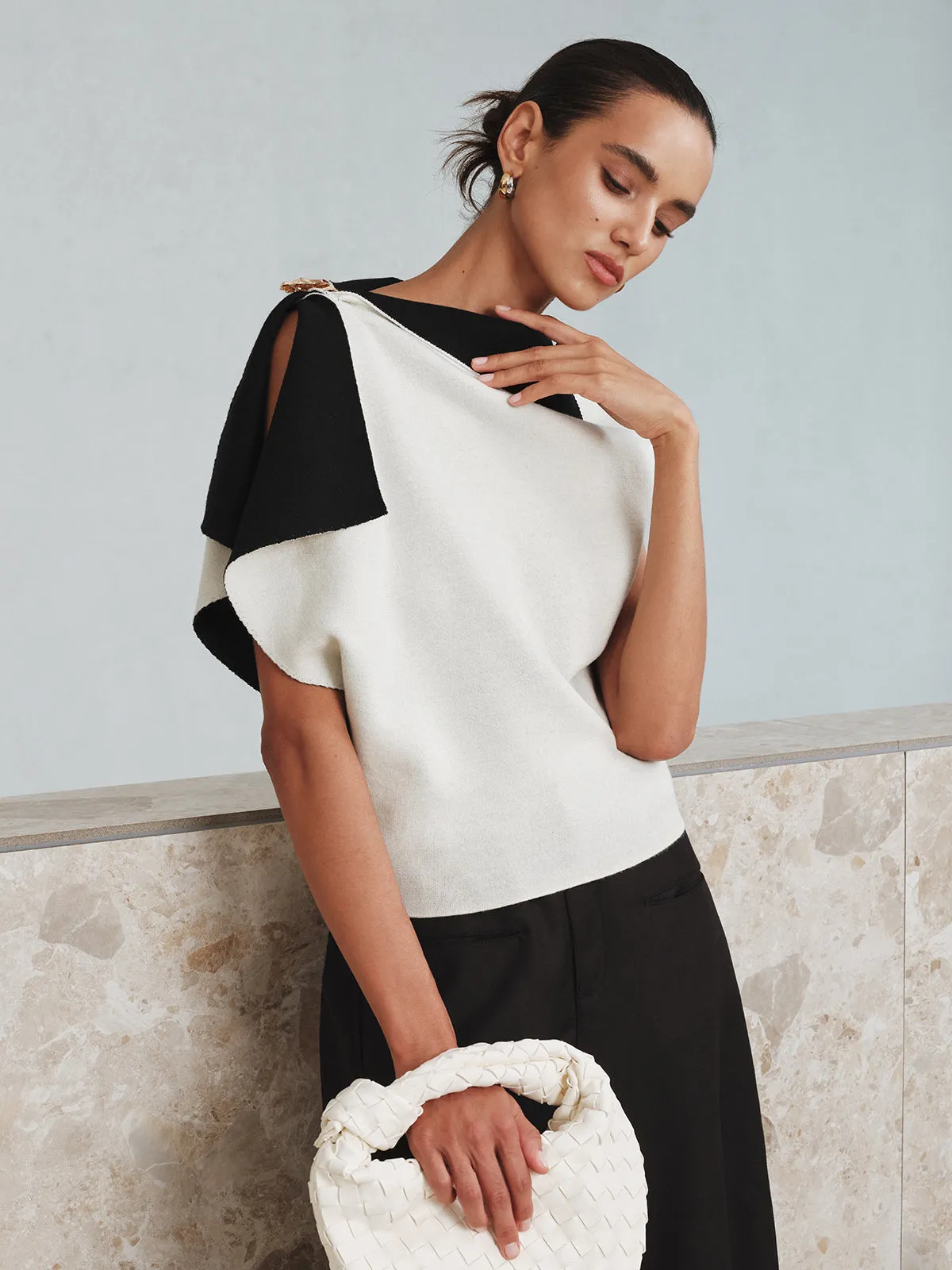Asymmetric Color-Block Knit Top sold by COMMENSE