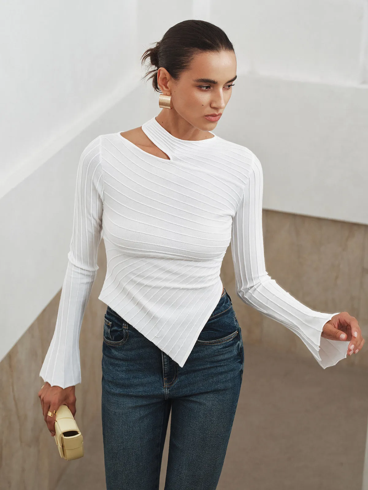 Asymmetric Cut-Out Textured Knit Top sold by COMMENSE