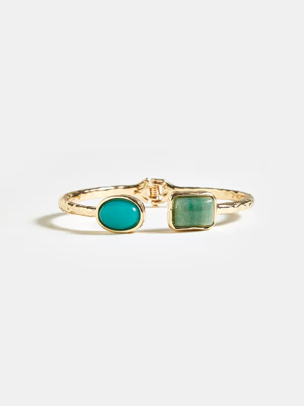 Hammered Turquoise Bracelet sold by COMMENSE