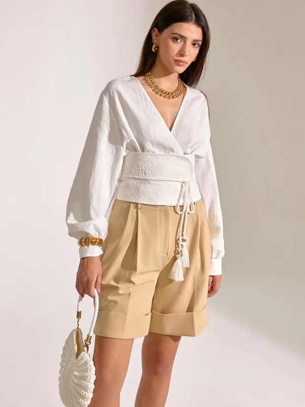 Cinched Waist Tassel Tie Wrap Blouse sold by COMMENSE