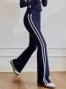 Slim Fit Side Striped High-Waist Pants sold by COMMENSE
