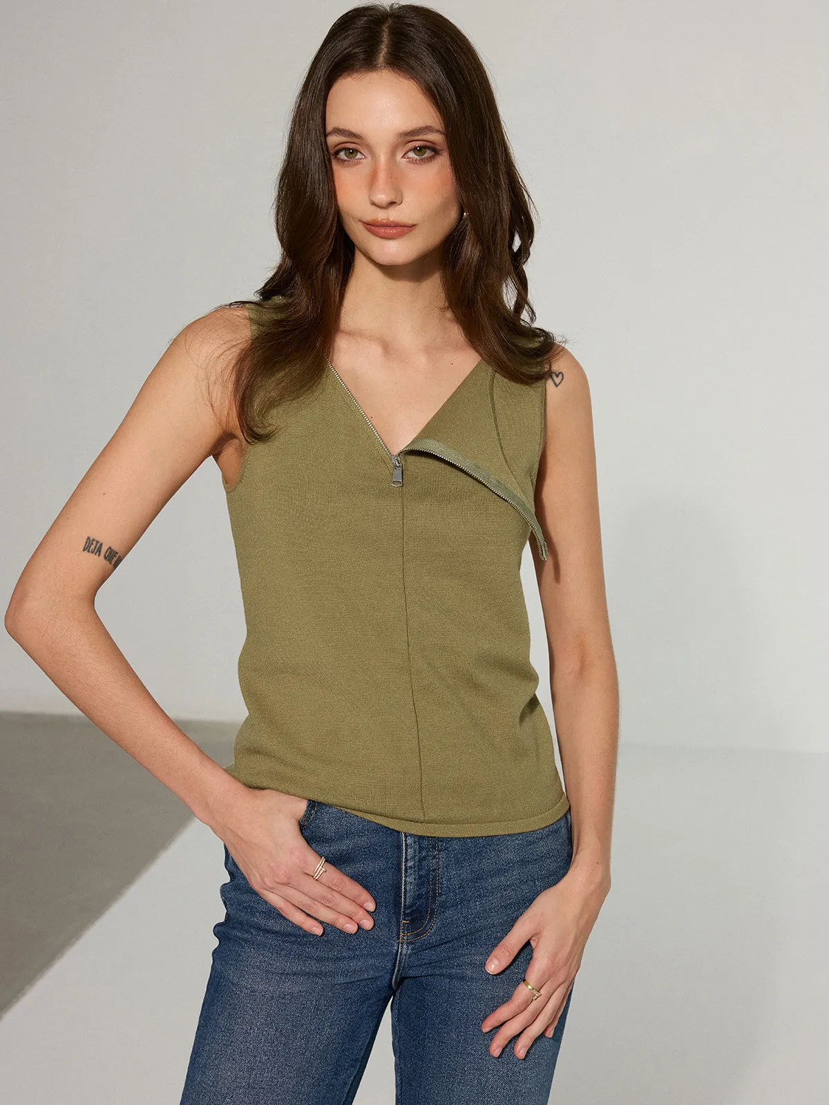 Asymmetric Zipper Sleeveless Top sold by COMMENSE
