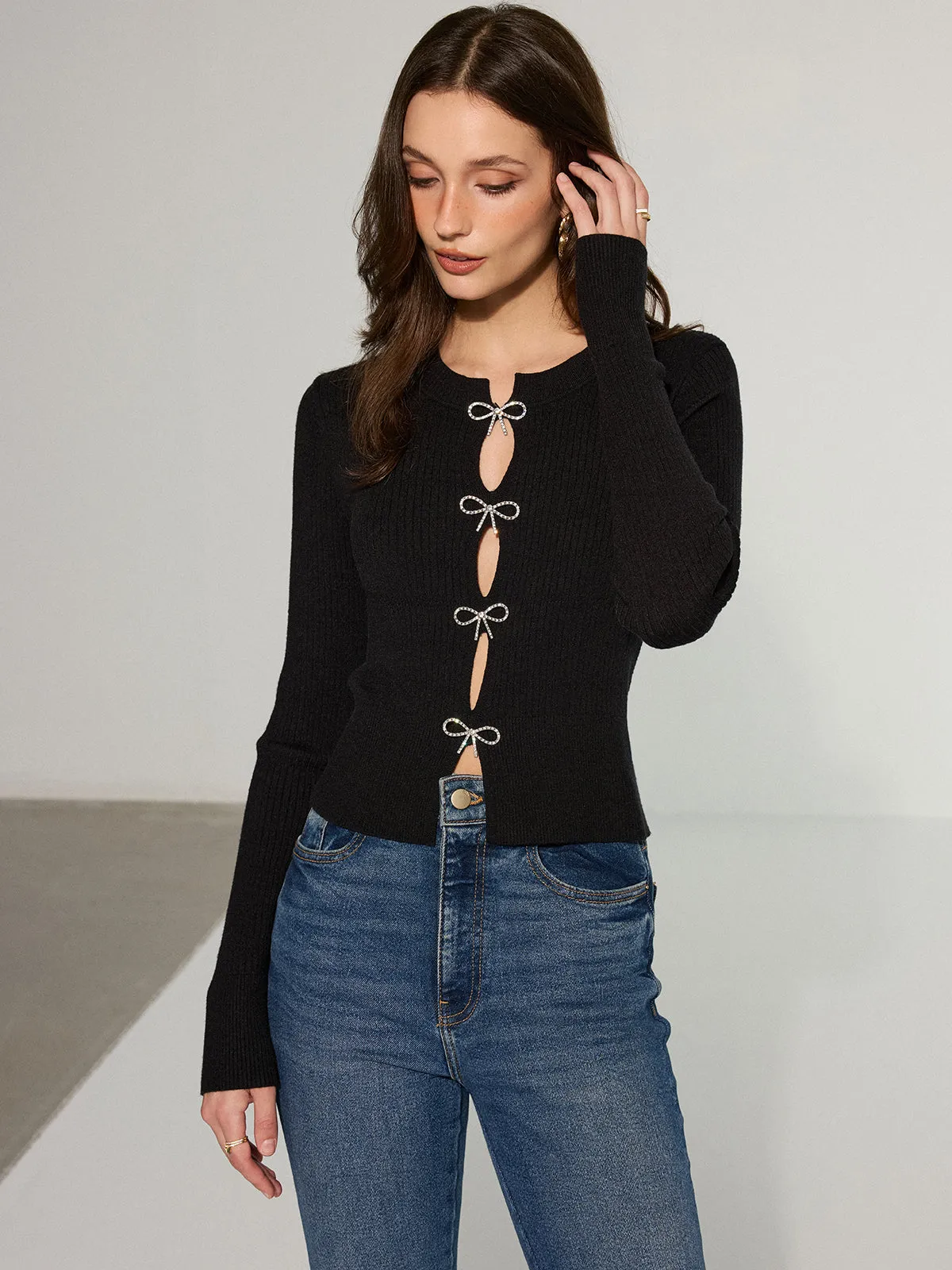 Bow Cut-Out Ribbed Knit Top sold by COMMENSE