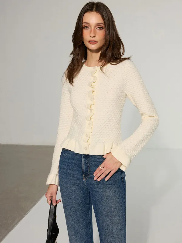Textured Ruffle Knit Top sold by COMMENSE