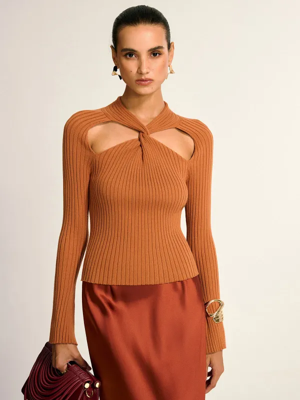 Twist Cut-Out Knit Top sold by COMMENSE