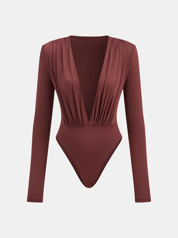 Boxy Shoulder Draped Plunging Neckline Bodysuit sold by COMMENSE