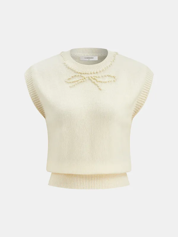 Pearl Bow Detail Cap Sleeve Knit Vest sold by COMMENSE