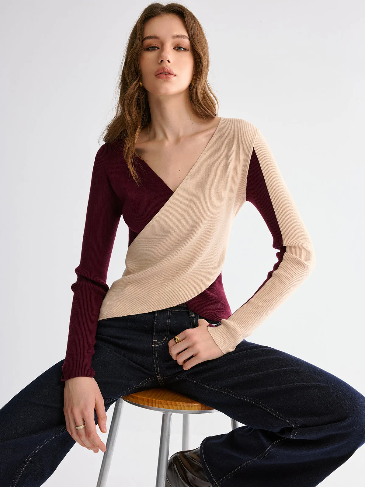 Two-Tone Asymmetrical-Hem Sweater sold by COMMENSE