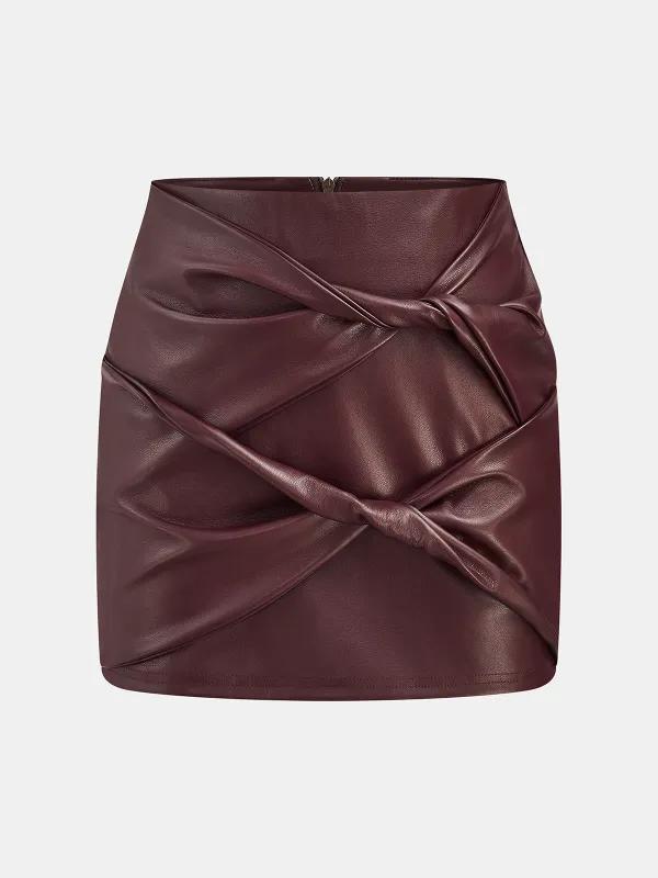 Twisted Lies Faux Leather Mini Skirt sold by COMMENSE
