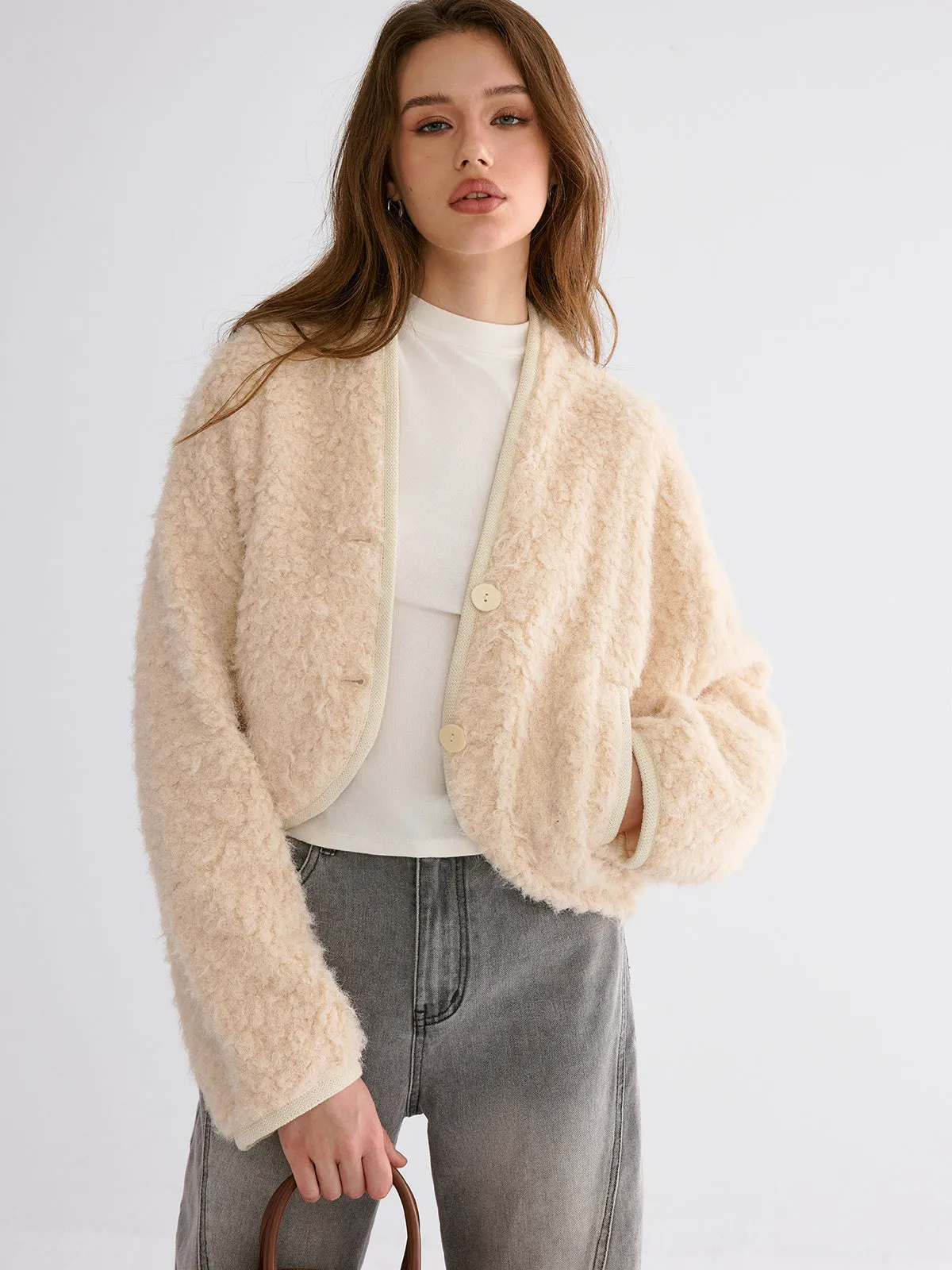 Drop-Shoulder Cropped Fuzzy Coat sold by COMMENSE