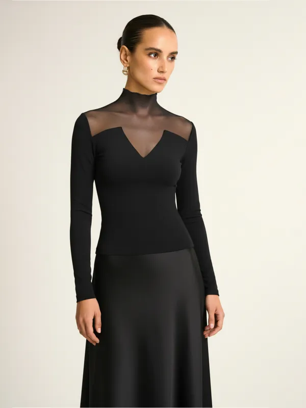 Sheer Paneled Long Sleeve Top sold by COMMENSE