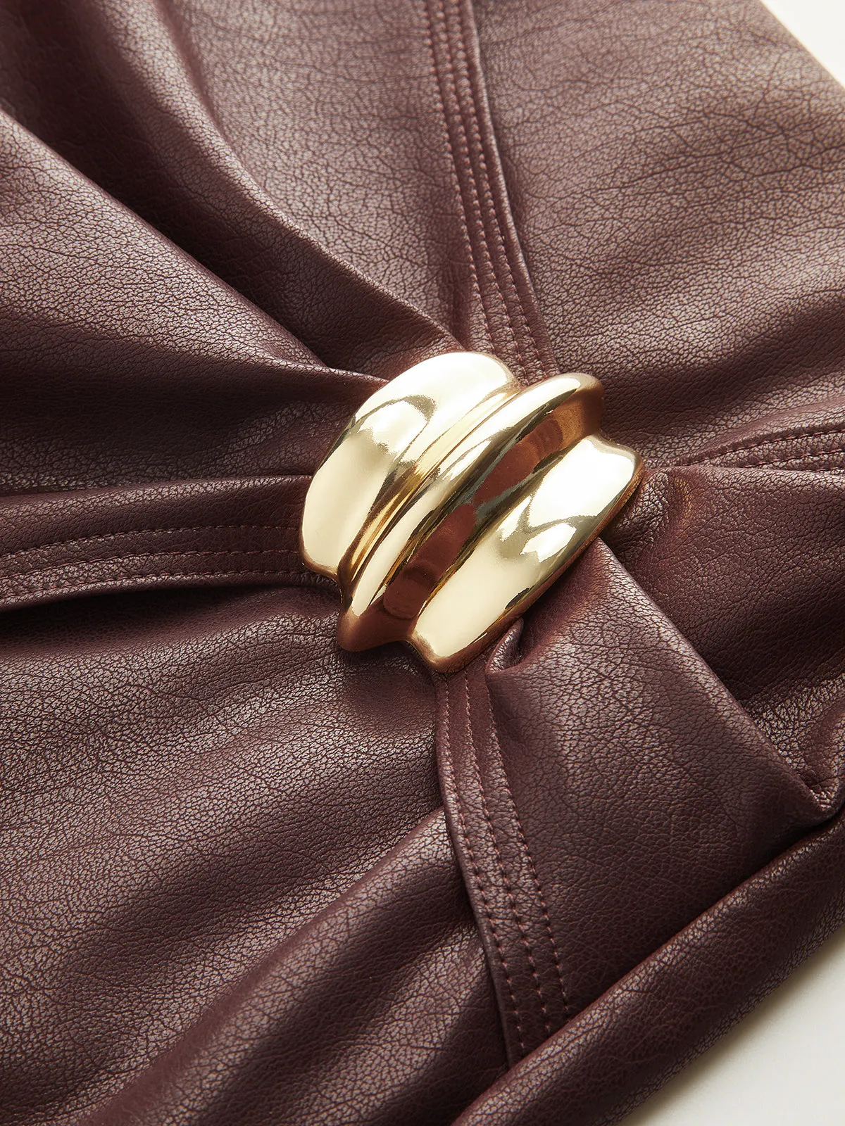 Metal Buckle Asymmetric Faux Leather Mini Skirt sold by COMMENSE product image thumbnail 3