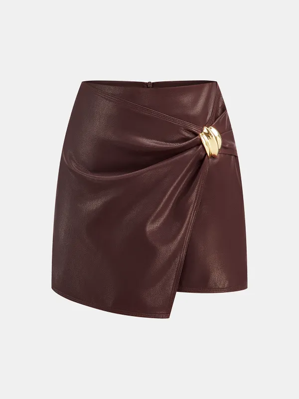 Metal Buckle Asymmetric Faux Leather Mini Skirt sold by COMMENSE