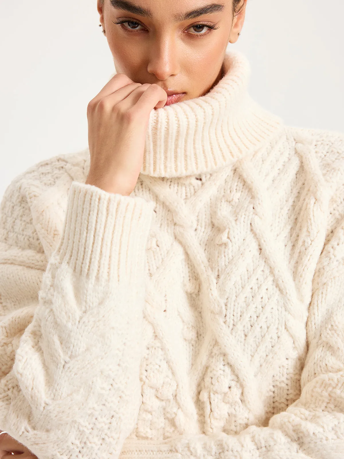 Fringe Hem Cable-Knit Turtleneck Sweater sold by COMMENSE product image thumbnail 4
