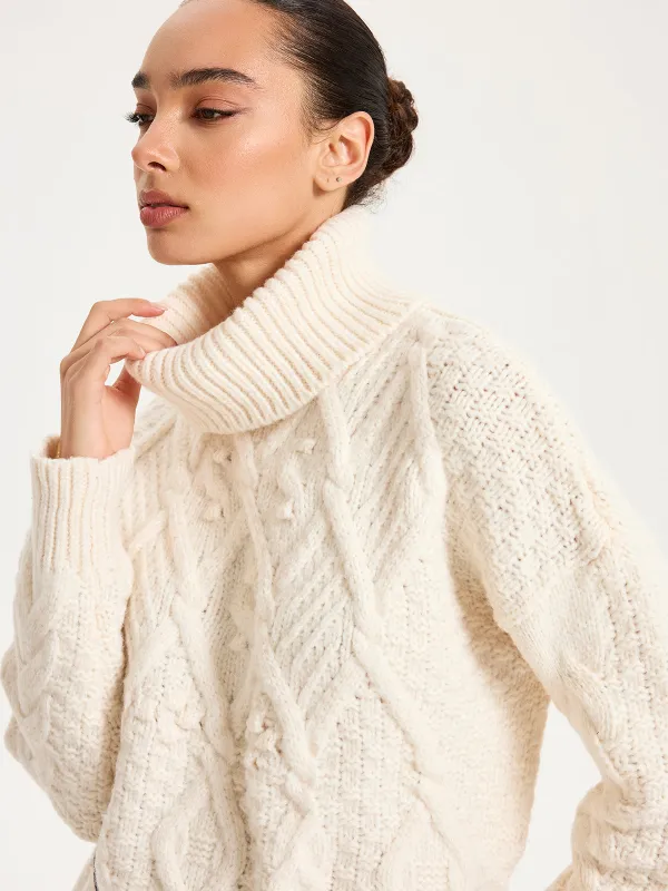 Fringe Hem Cable-Knit Turtleneck Sweater sold by COMMENSE