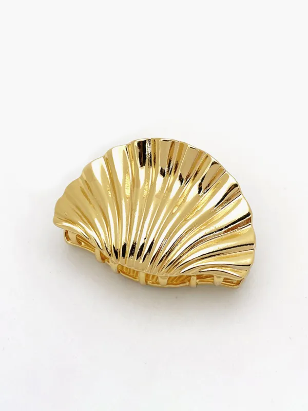 Golden Shell Hair Claw sold by COMMENSE