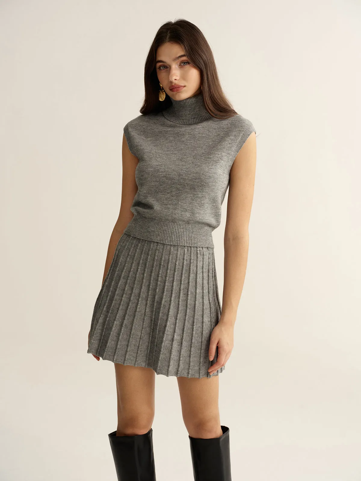 Turtleneck Sleeveless Top and Mini Skirt Set sold by COMMENSE